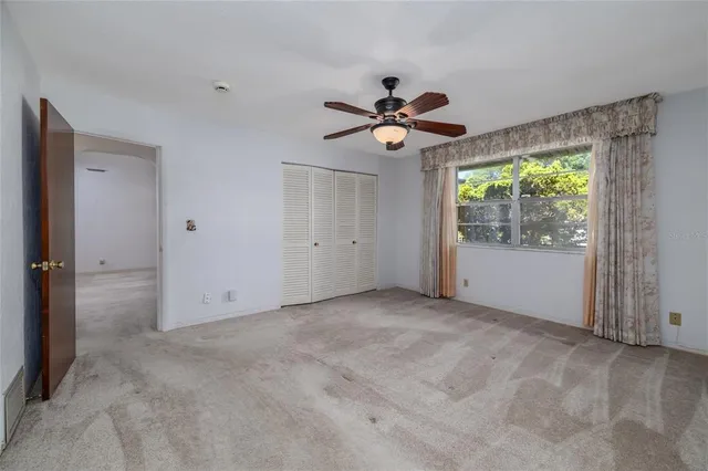 a bathroom with a sink vanity and a mirror