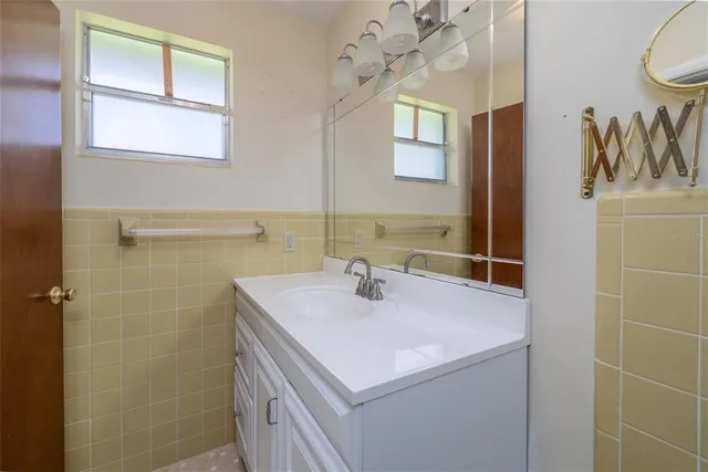 a bathroom with a toilet and shower