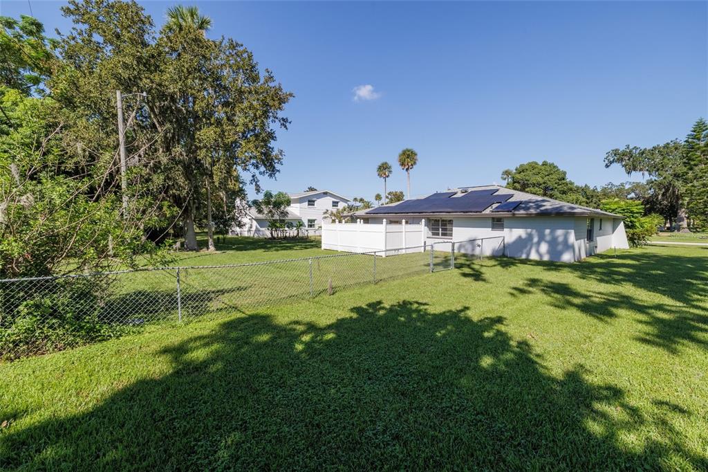 901 Duncan Road South Daytona, FL 32119 - Photo 20 of 22 a view of a house with a big yard