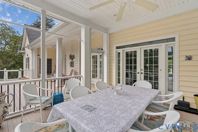 a view of a house with backyard and porch