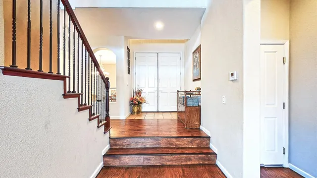 a view of staircase with black and white walls