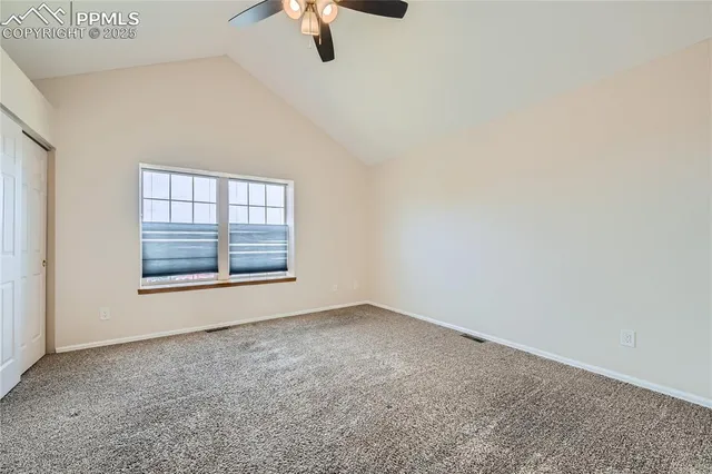 an empty room with a empty space and windows