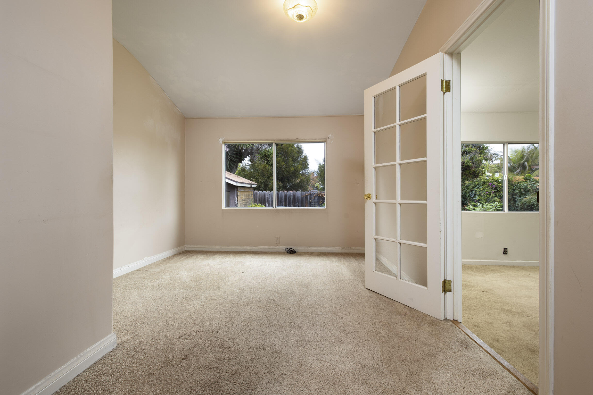 4822 9th Street Carpinteria, CA 93013 - Photo 12 of 22 an empty room with windows