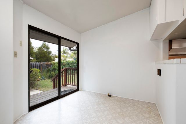 a house with a plant in front of it