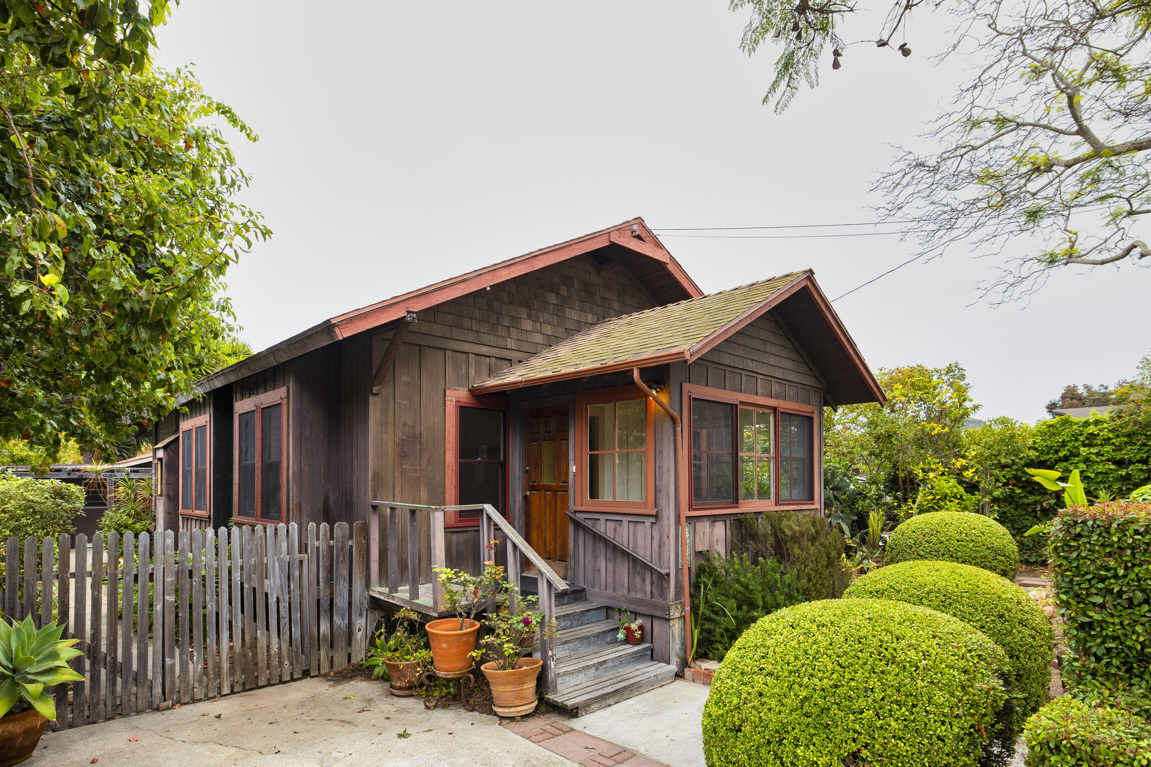 4822 9th Street Carpinteria, CA 93013 - Photo 6 of 22 a view of a house with wooden fence