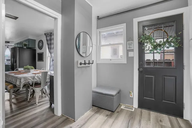 a view of a livingroom with furniture and windows