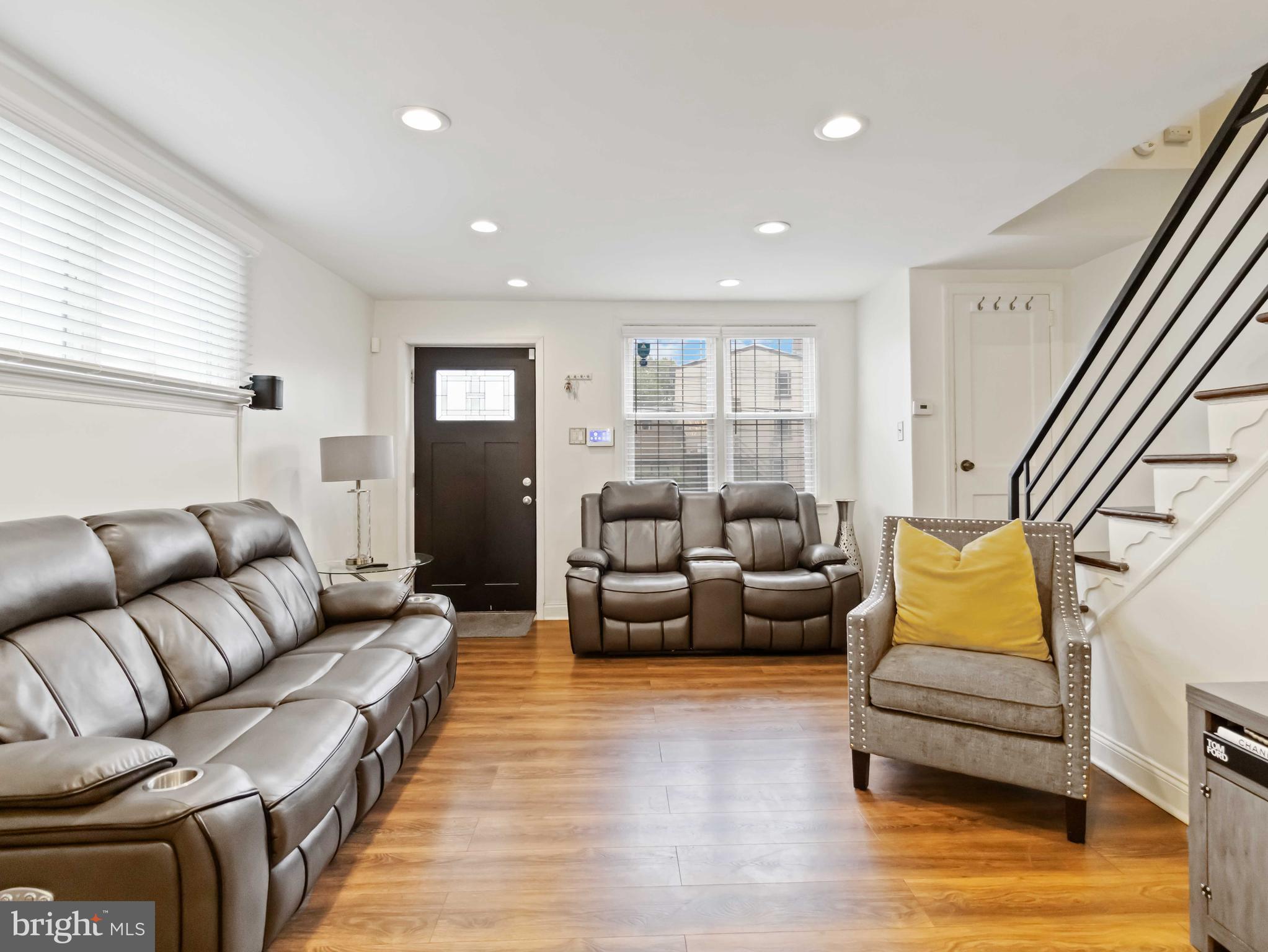 1008 Springfield Road Collingdale, PA 19023 - Photo 11 of 48 a living room with furniture and a couch