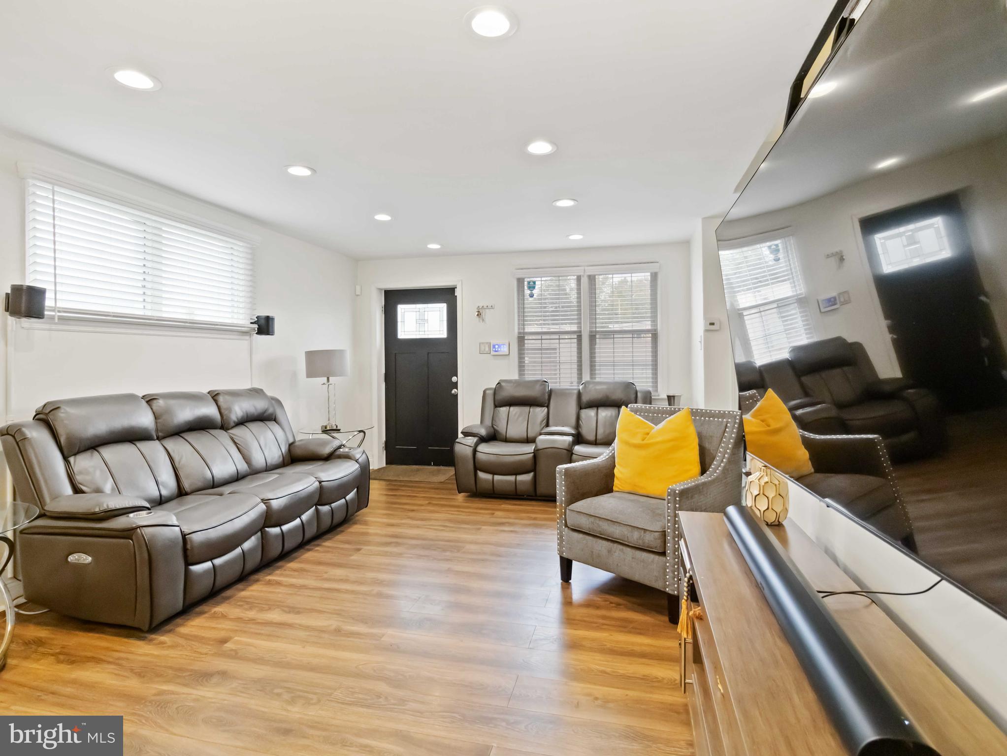 1008 Springfield Road Collingdale, PA 19023 - Photo 13 of 48 a living room with furniture and a wooden floor