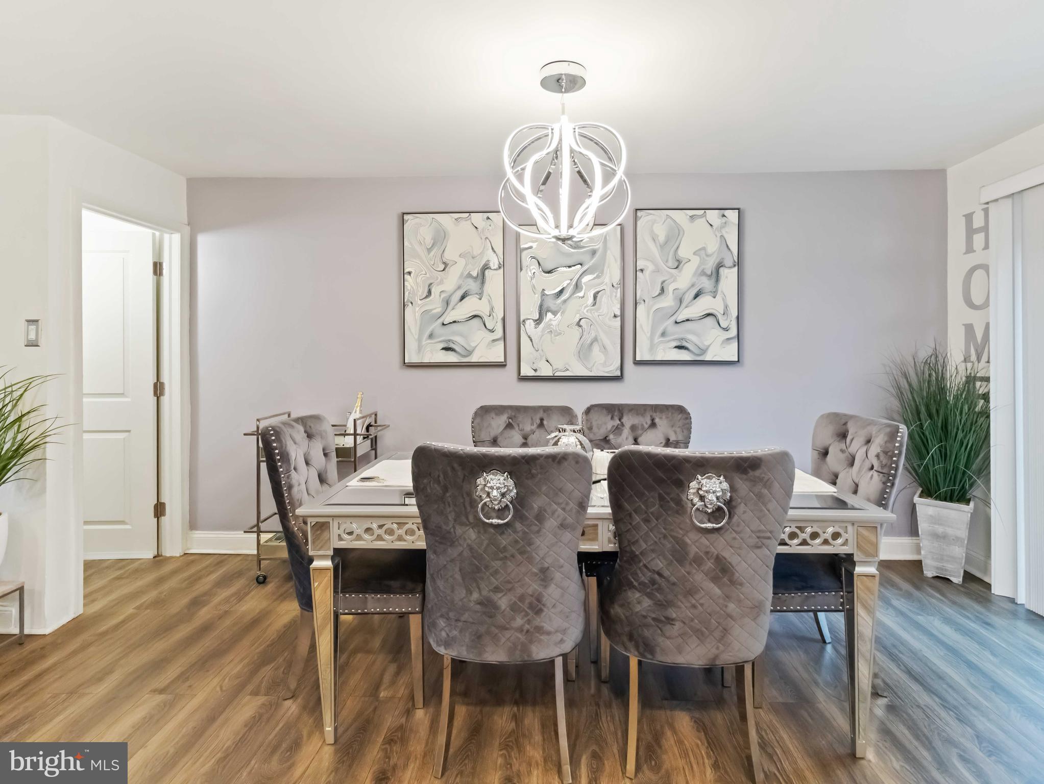 1008 Springfield Road Collingdale, PA 19023 - Photo 23 of 48 a view of a dining room with furniture and wooden floor