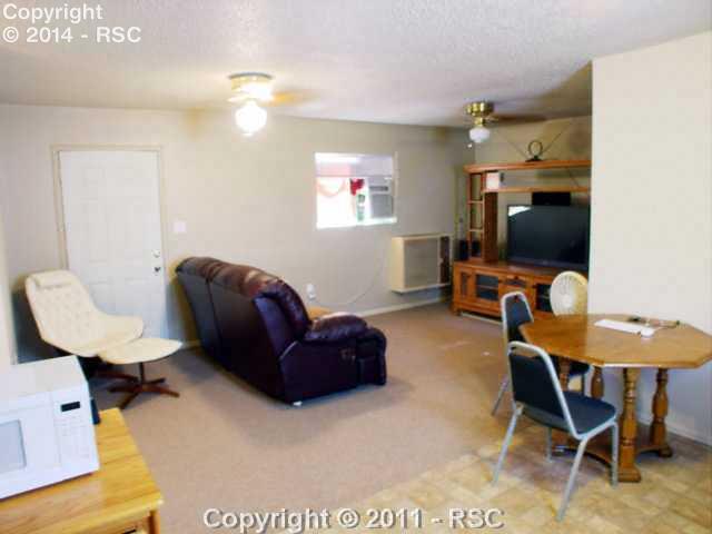 4835 Meridian Road Peyton, CO 80831 - Photo 11 of 16 Guest House Living Room