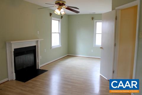 4375 Sharon Road Esmont, VA 22937 - Photo 19 of 37 a view of an empty room with a window and wooden floor