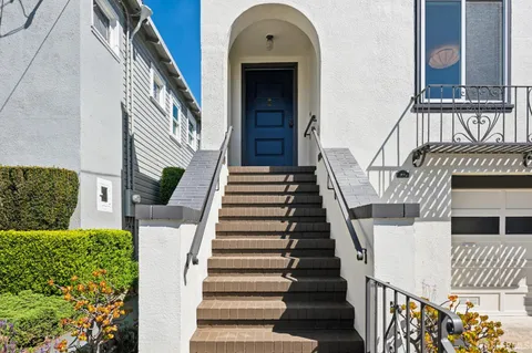 an entryway view with staircase