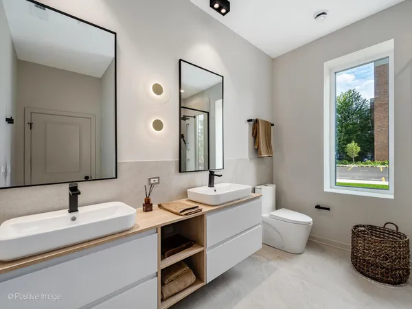 a bathroom with a shower and a sink
