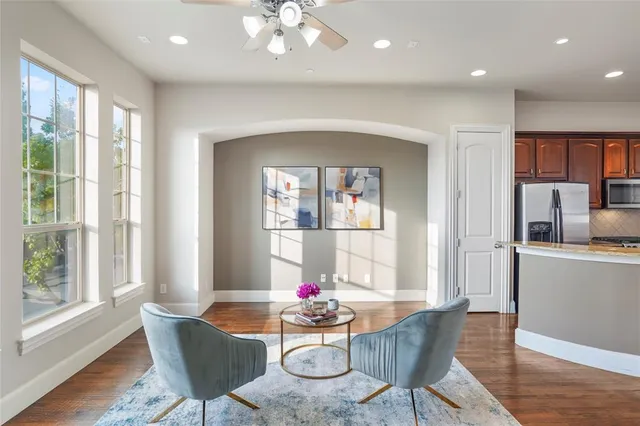 a dining room with furniture and window