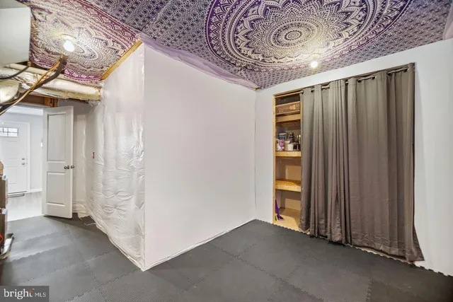 a view of an entryway with a hallway