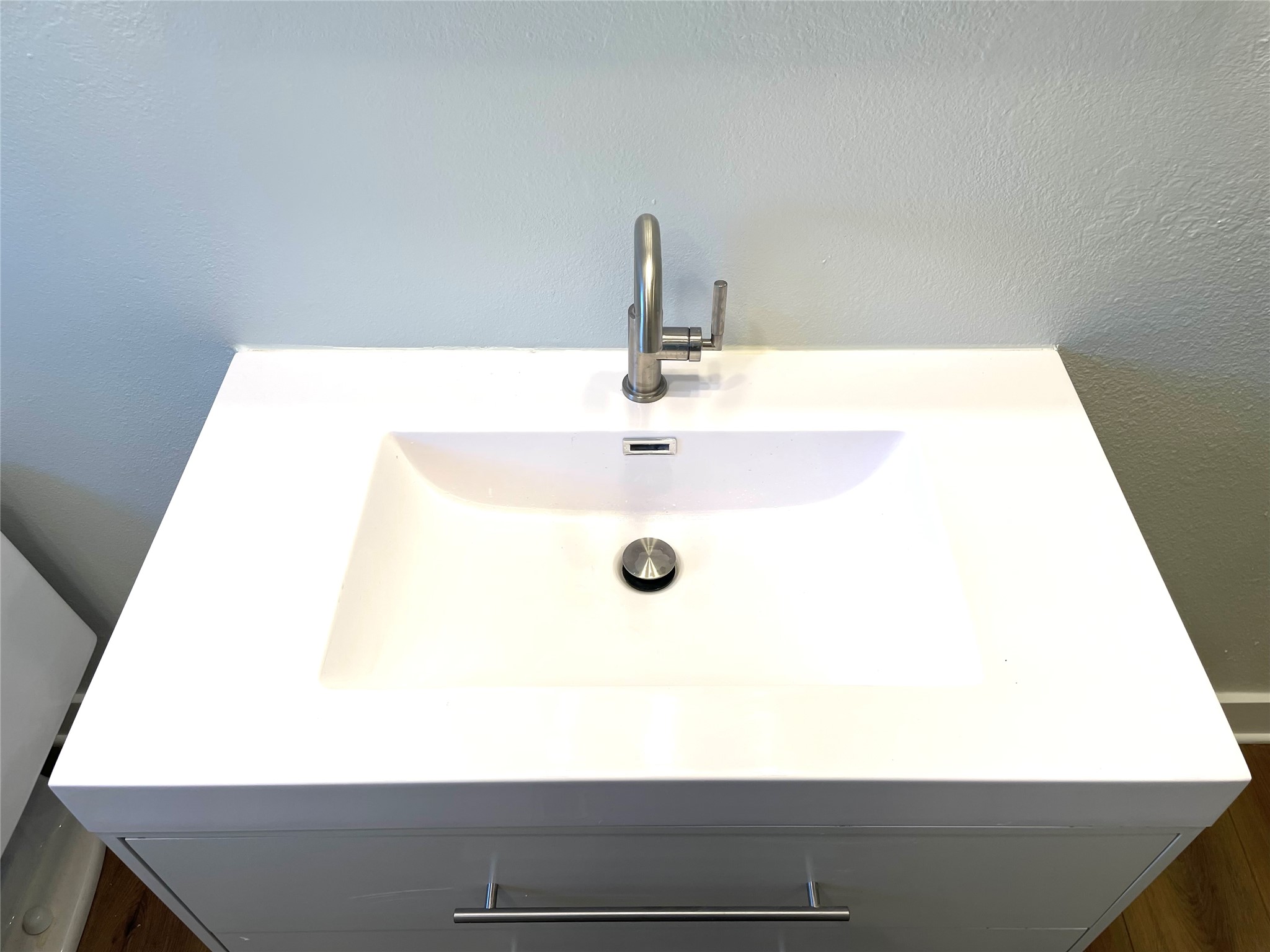 807 East Riverside Drive, Unit A Austin, TX 78704 - Photo 18 of 29 Bathroom view of vanity and a textured wall