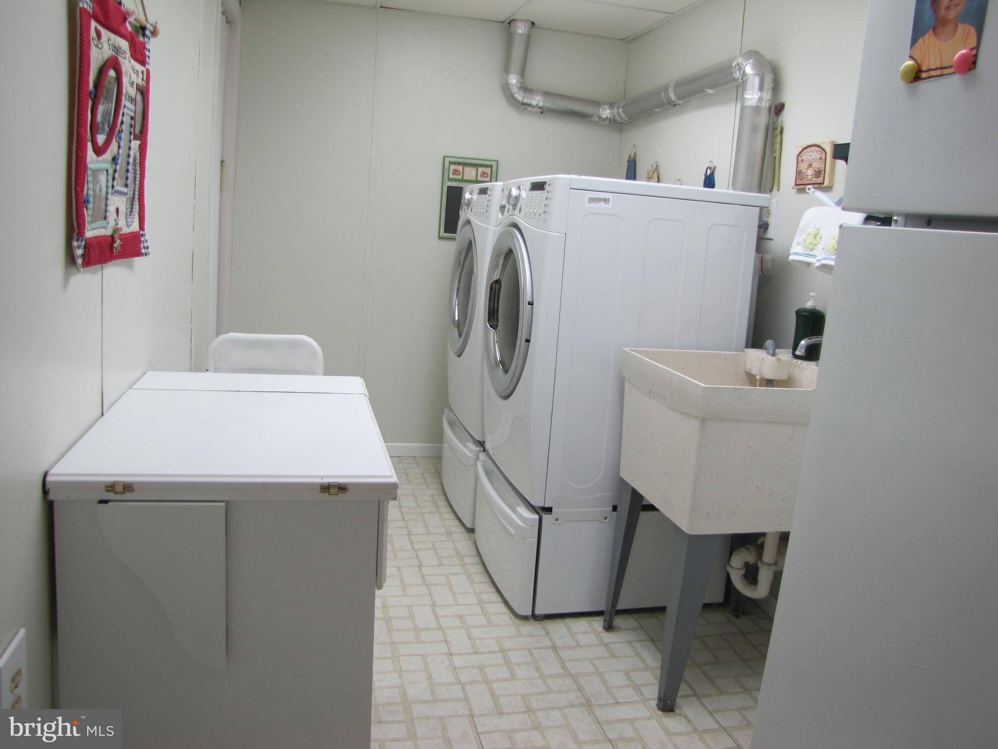 7767 Notley Road Pasadena, MD 21122 - Photo 29 of 31 Laundry Room