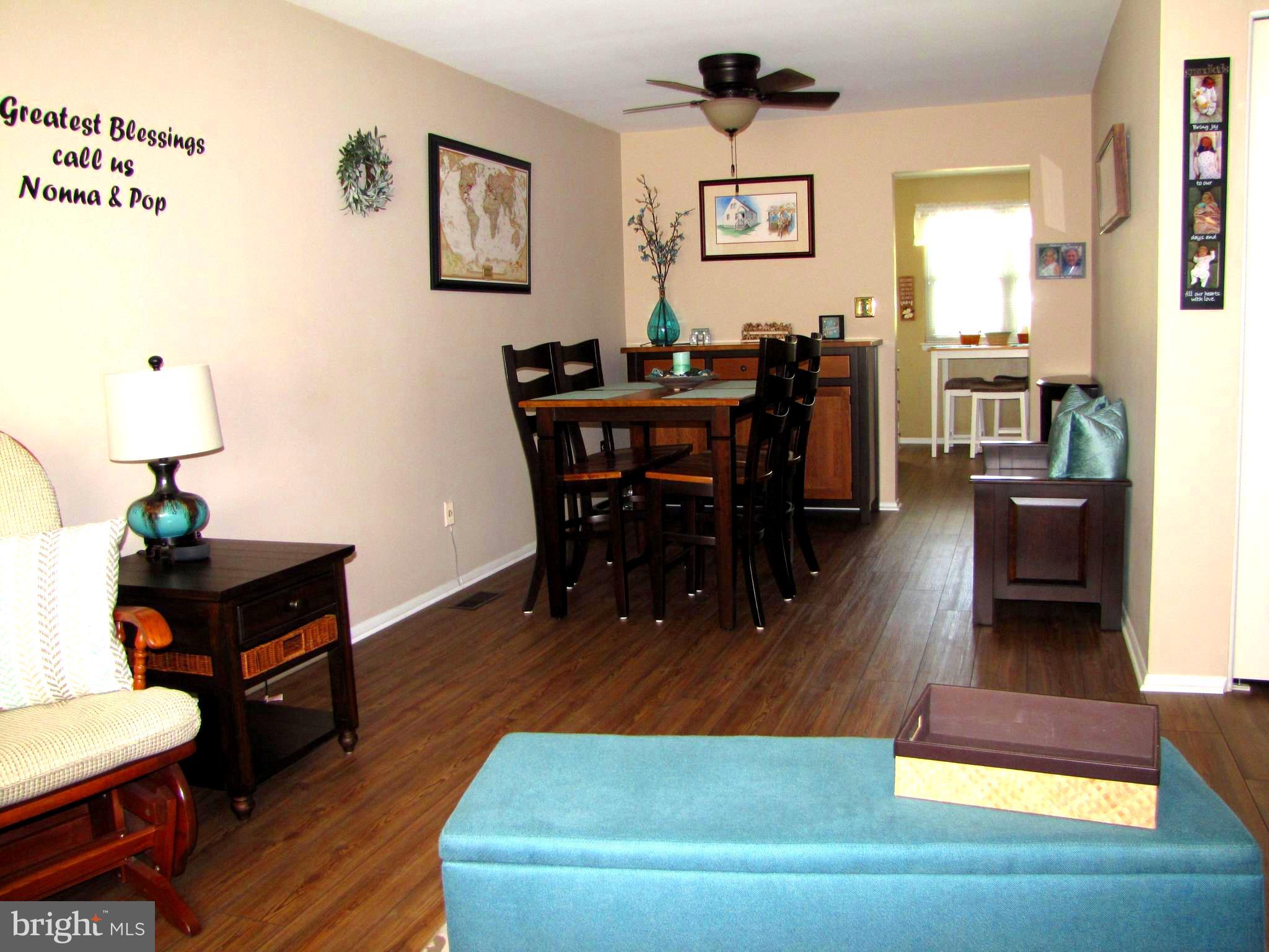 7767 Notley Road Pasadena, MD 21122 - Photo 5 of 31 Living Room into Dining room