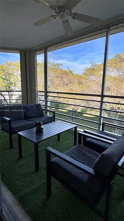 a view of a outdoor space with seating area