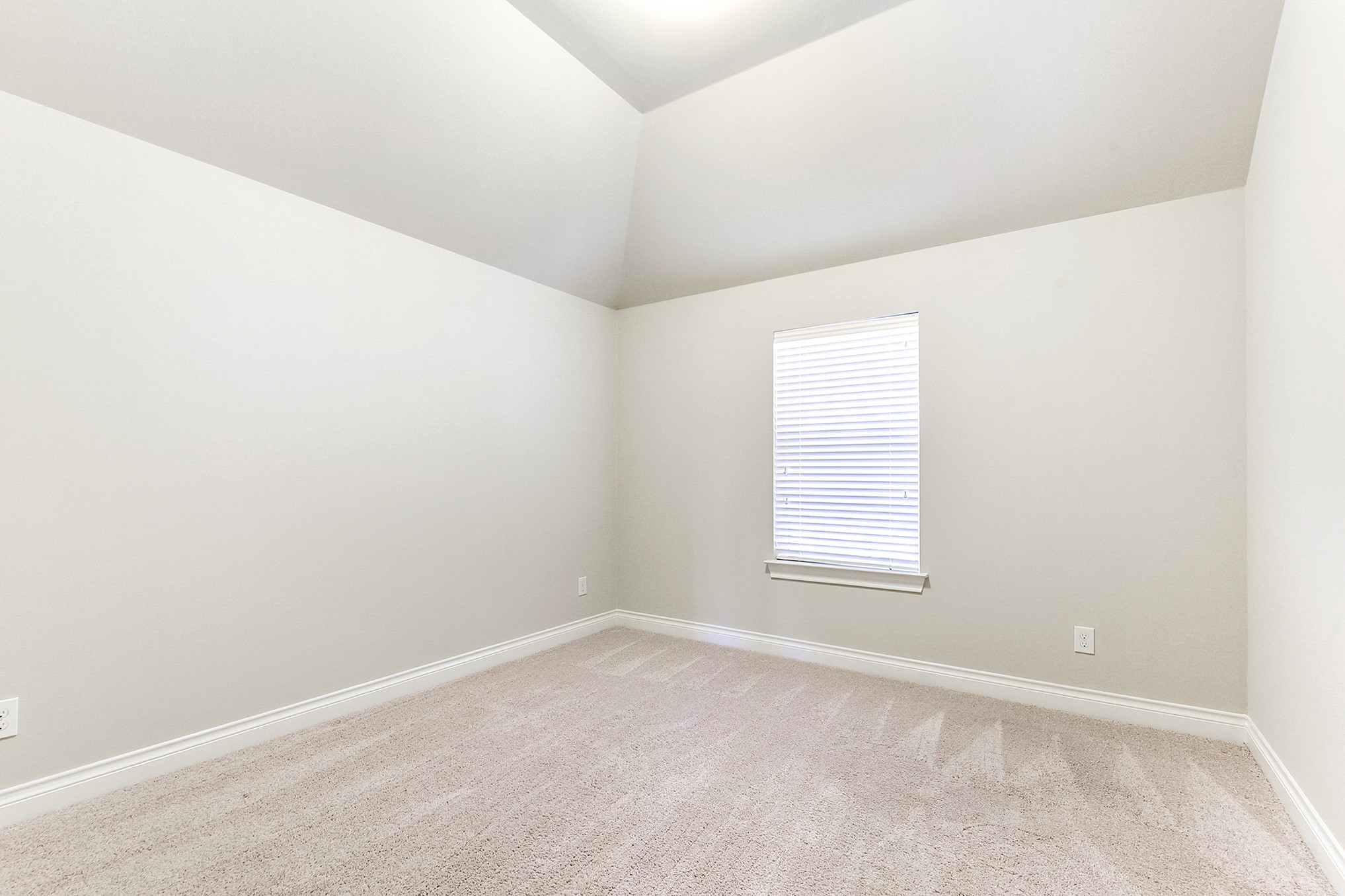 29023 Powder Ridge Drive Katy, TX 77494 - Photo 32 of 50 The home offers three spacious guest bedrooms, all located on the second floor. Each bedroom features elevated ceilings, plush carpeting, and generously sized closet space, providing comfort and plenty of storage for family or guests. Located upstairs is a shared bathroom between two of the upstairs guest rooms.