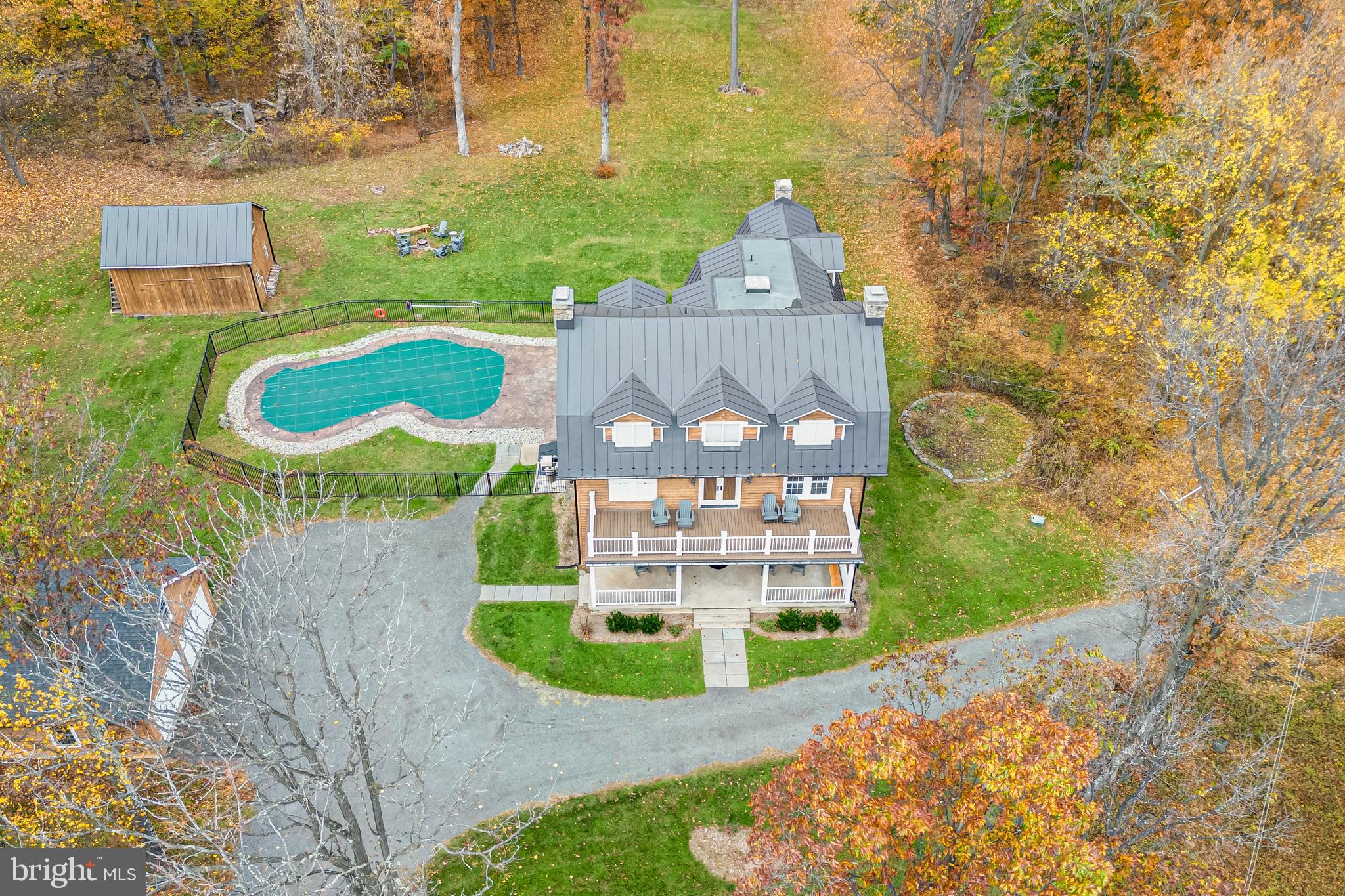 17345 Raven Rocks Road Bluemont, VA 20135 - Photo 4 of 99 a view of a multi story building with a yard