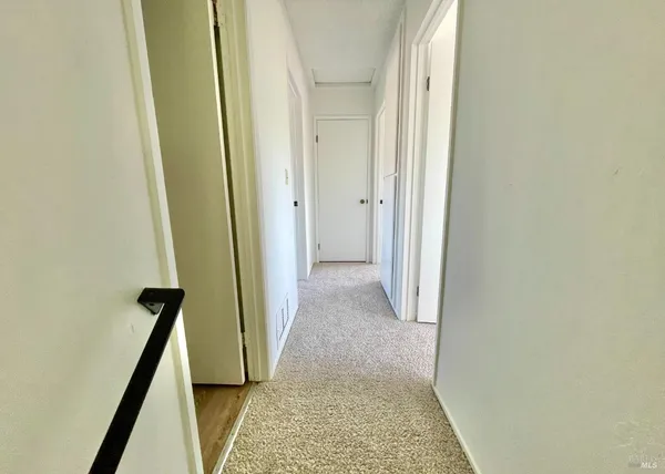 an empty room with a bench
