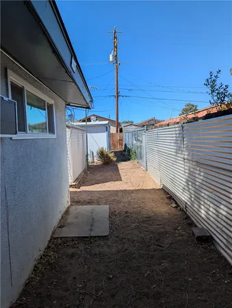 a view of a street with an ocean view
