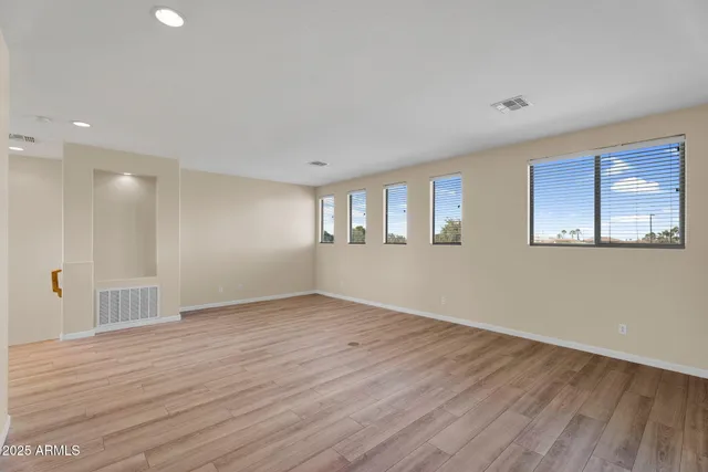 a view of a swimming pool with an outdoor space and seating area