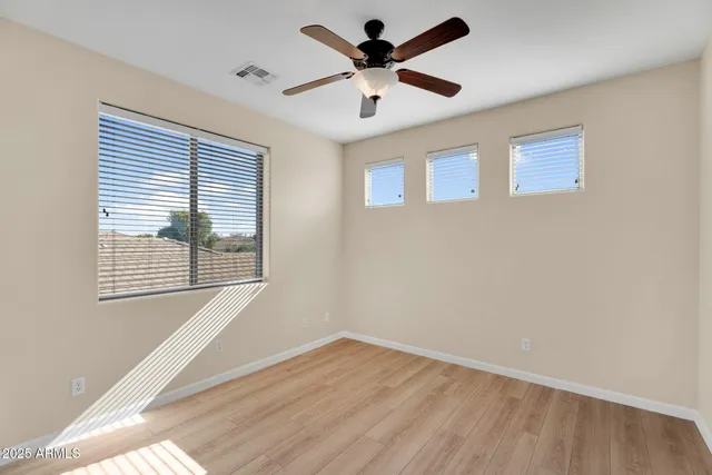 an aerial view of a house with a swimming pool yard and outdoor seating