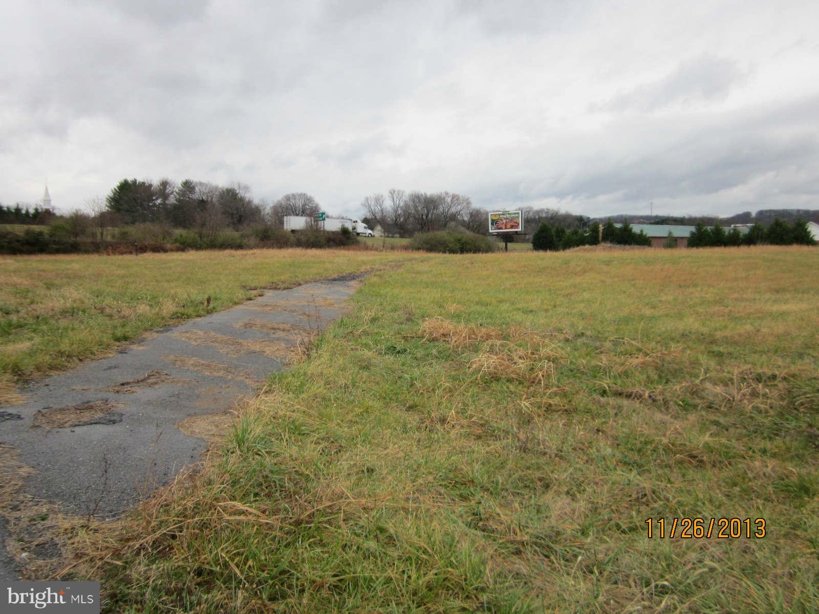 3850 Roundtree Road Jefferson, MD 21755 - Photo 2 of 2 a view of a lake with houses in back