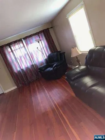 a view of livingroom with wooden floor