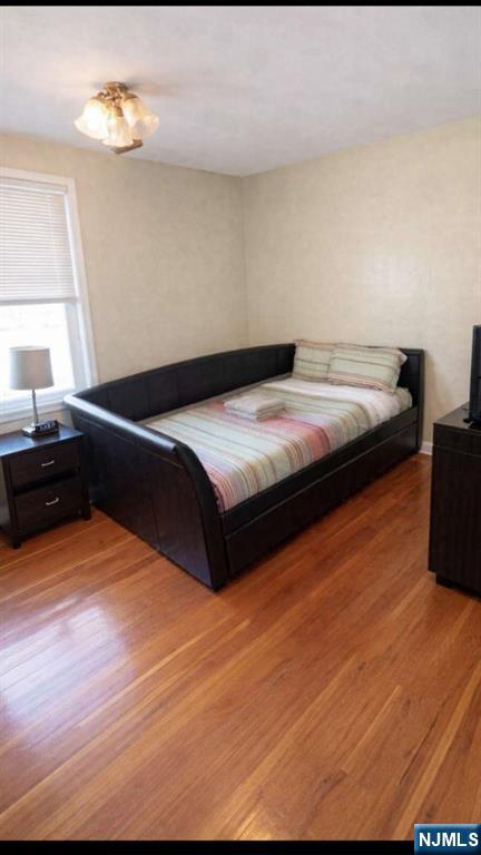 25 Harvard Place Belleville, NJ 07109 - Photo 6 of 6 a bedroom with bed and window