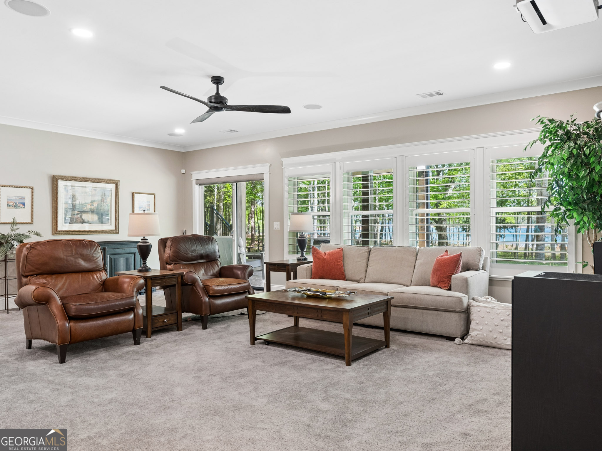 143 Carlota Way Hartwell, GA 30643 - Photo 22 of 48 a living room with furniture and large windows