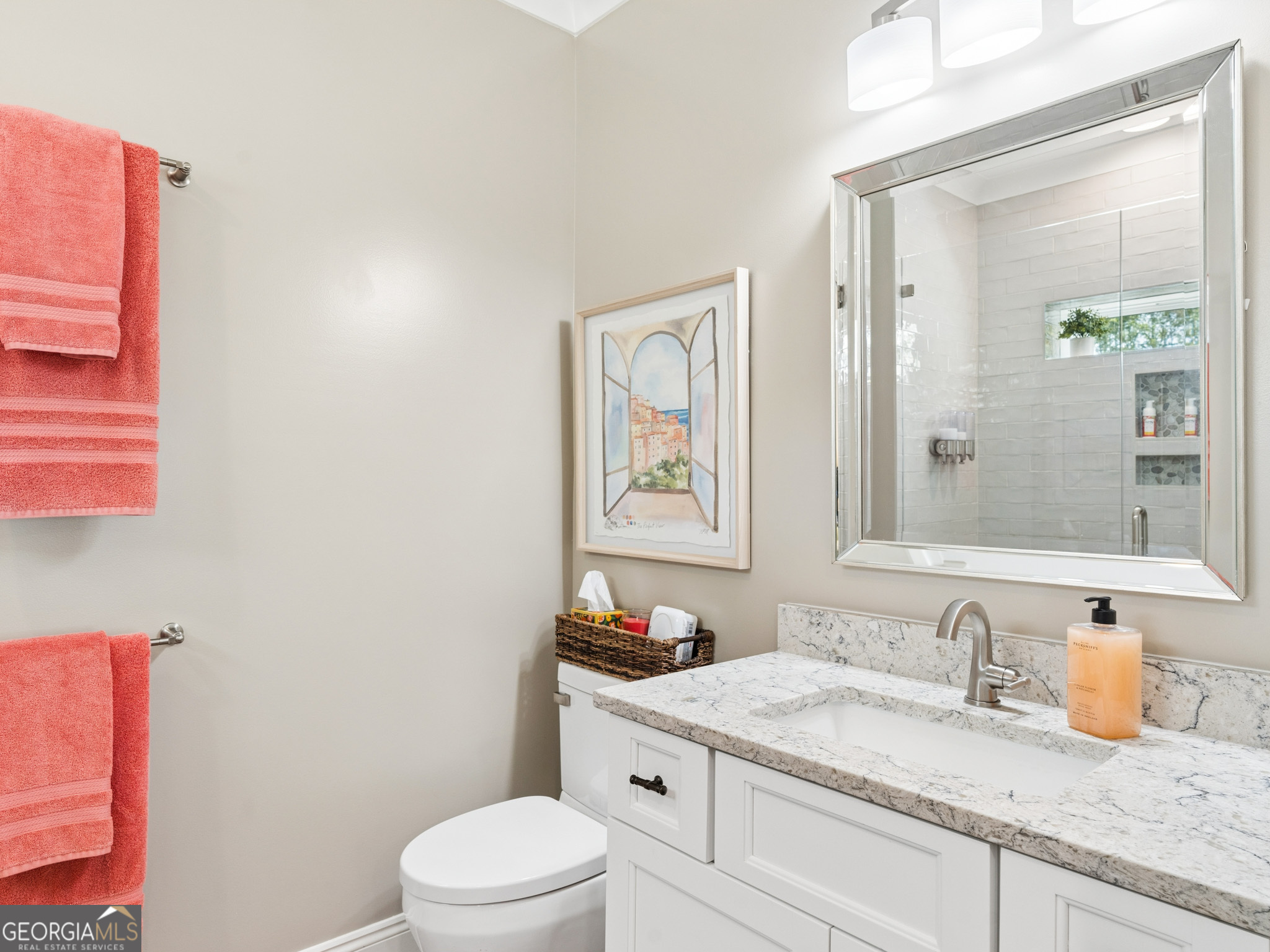 143 Carlota Way Hartwell, GA 30643 - Photo 26 of 48 a bathroom with a granite countertop sink mirror vanity and toilet