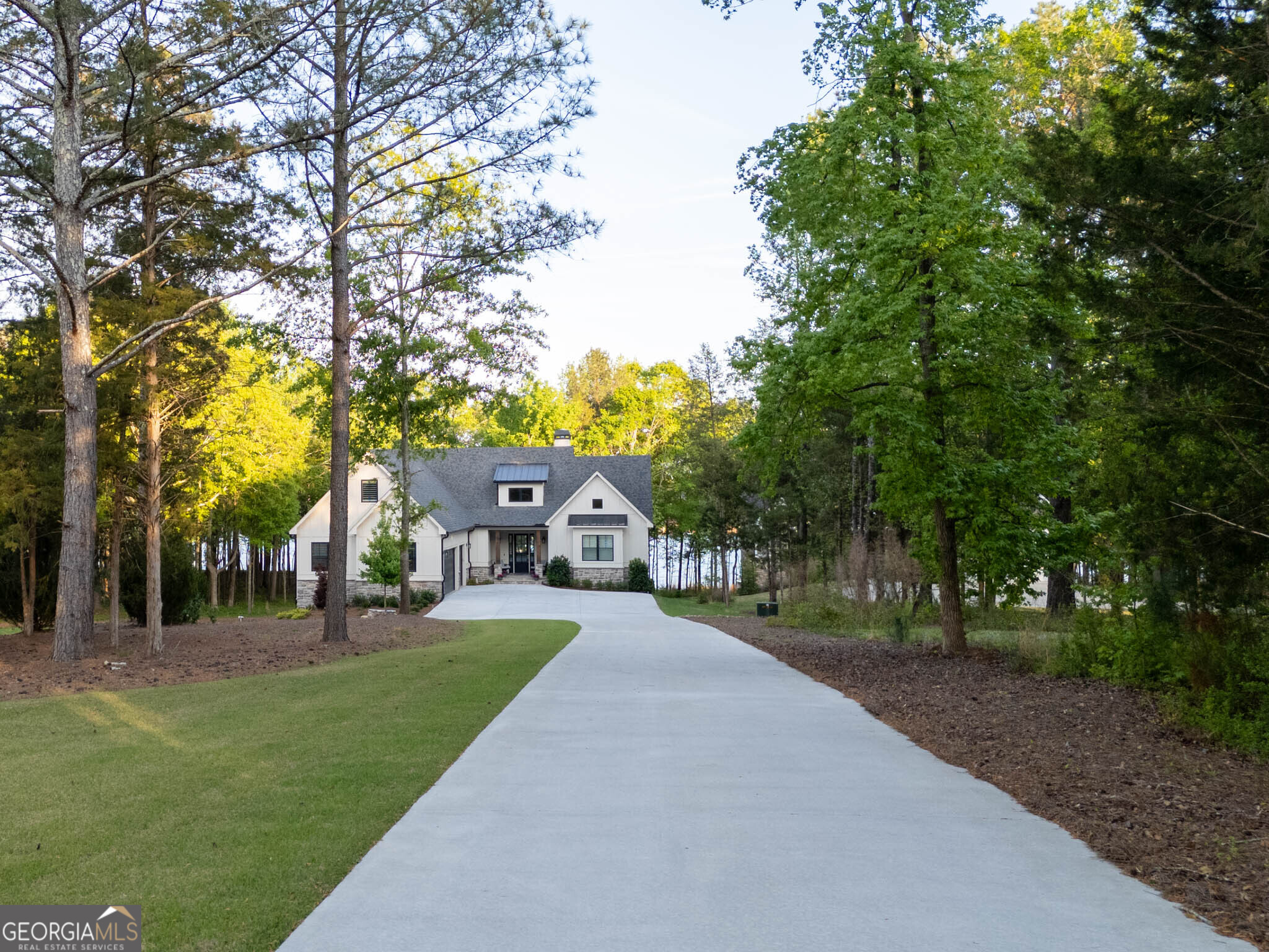 143 Carlota Way Hartwell, GA 30643 - Photo 3 of 48 a front view of a house with a yard and trees