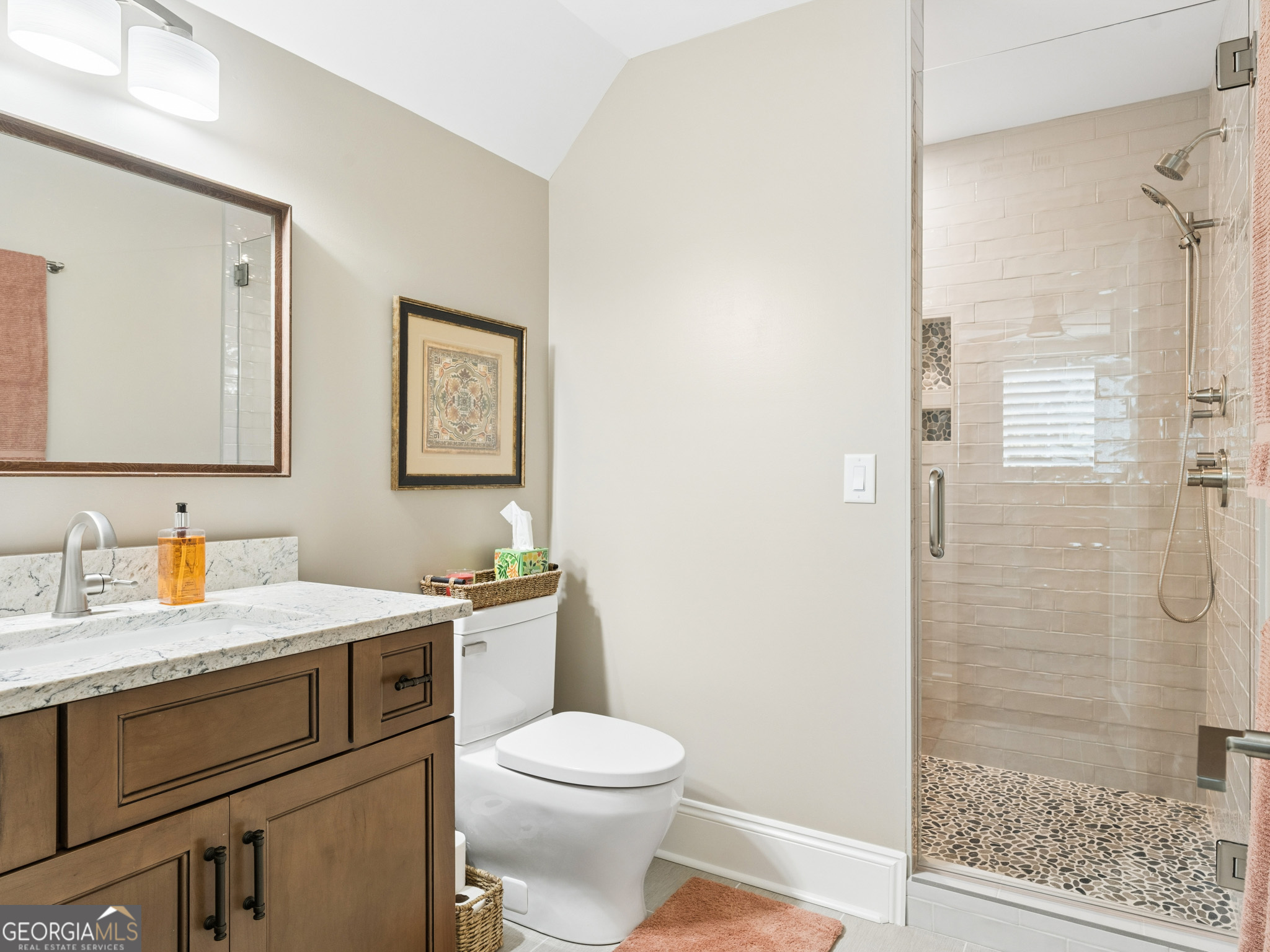 143 Carlota Way Hartwell, GA 30643 - Photo 32 of 48 a bathroom with a toilet sink vanity and shower