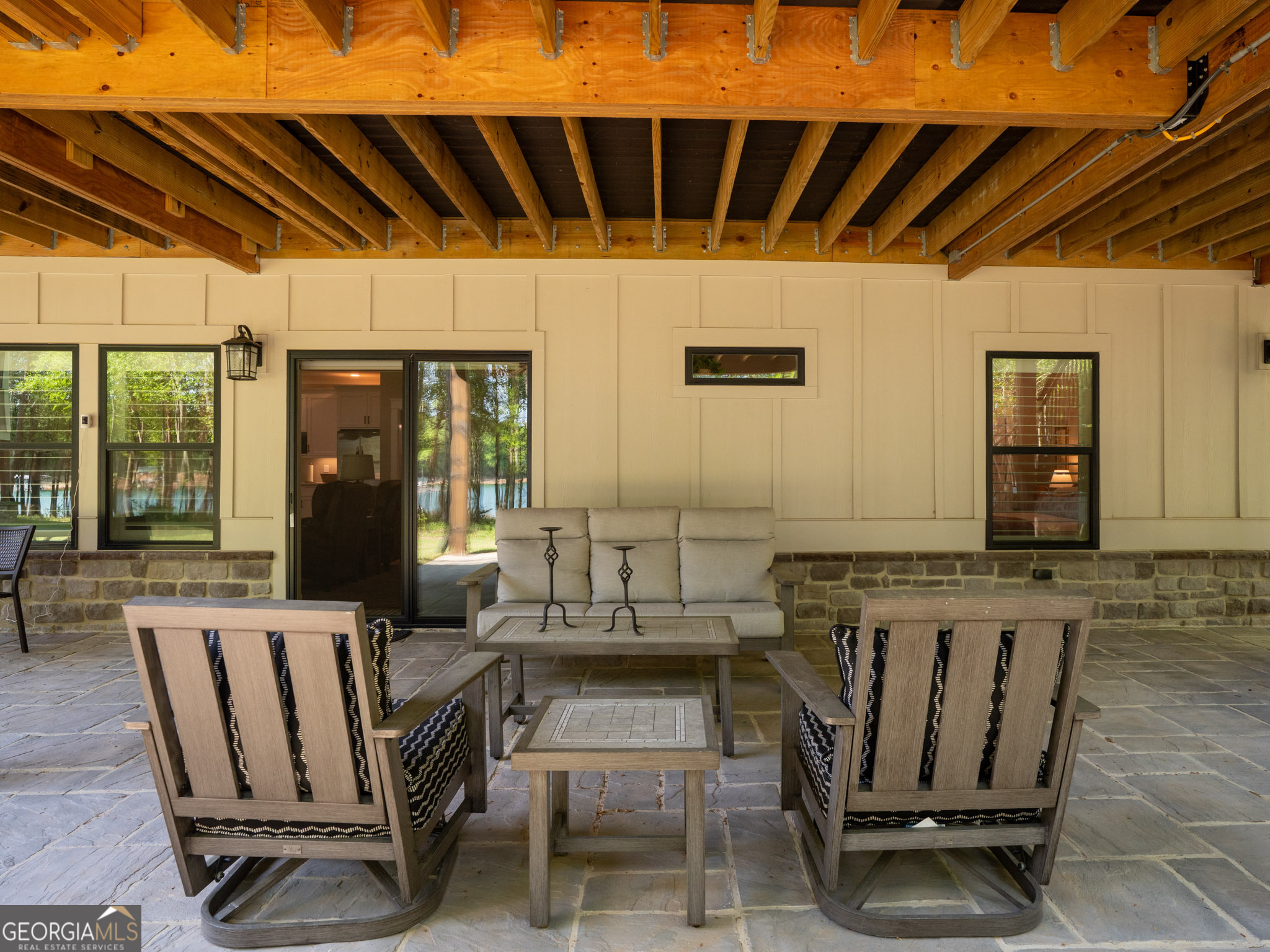 143 Carlota Way Hartwell, GA 30643 - Photo 37 of 48 a view of a patio with table and chairs