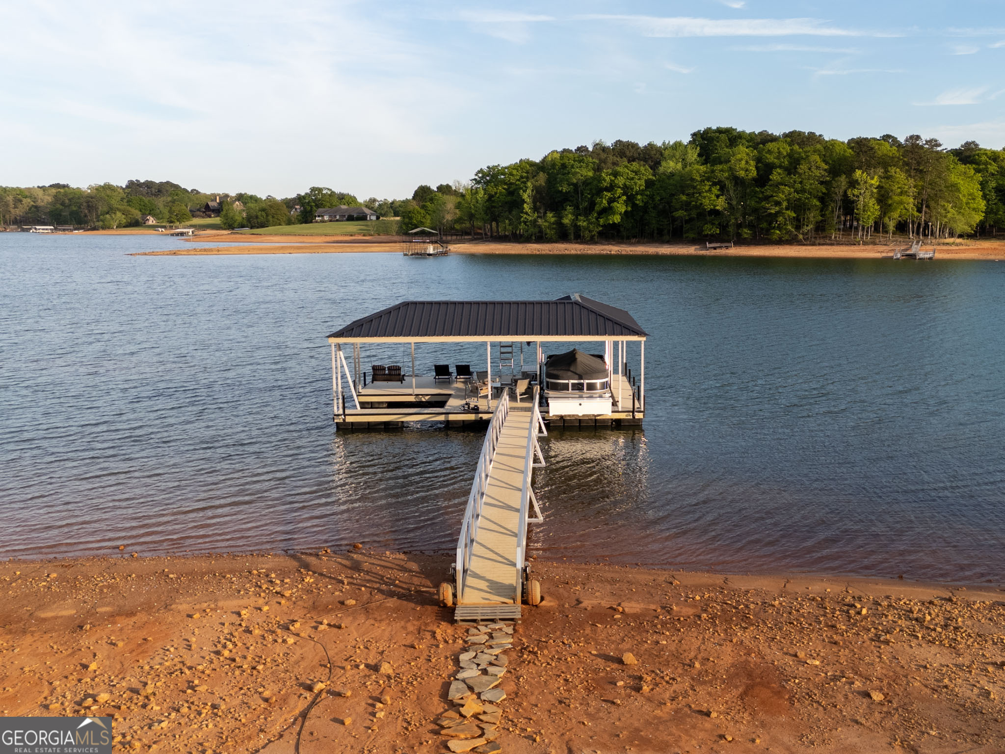 143 Carlota Way Hartwell, GA 30643 - Photo 43 of 48 a view of a lake with a mountain in the background