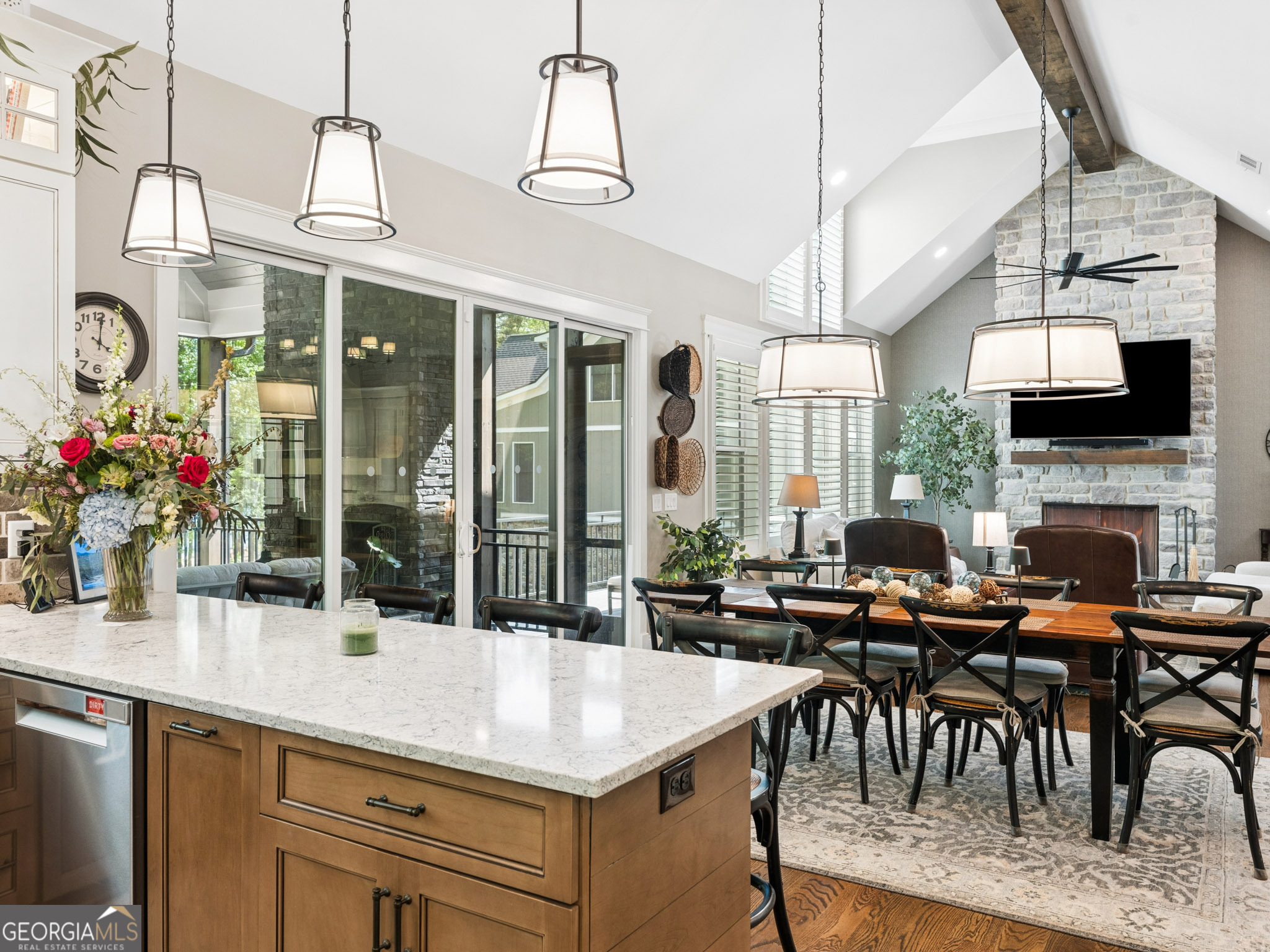 143 Carlota Way Hartwell, GA 30643 - Photo 6 of 48 a kitchen with a table chairs and a chandelier