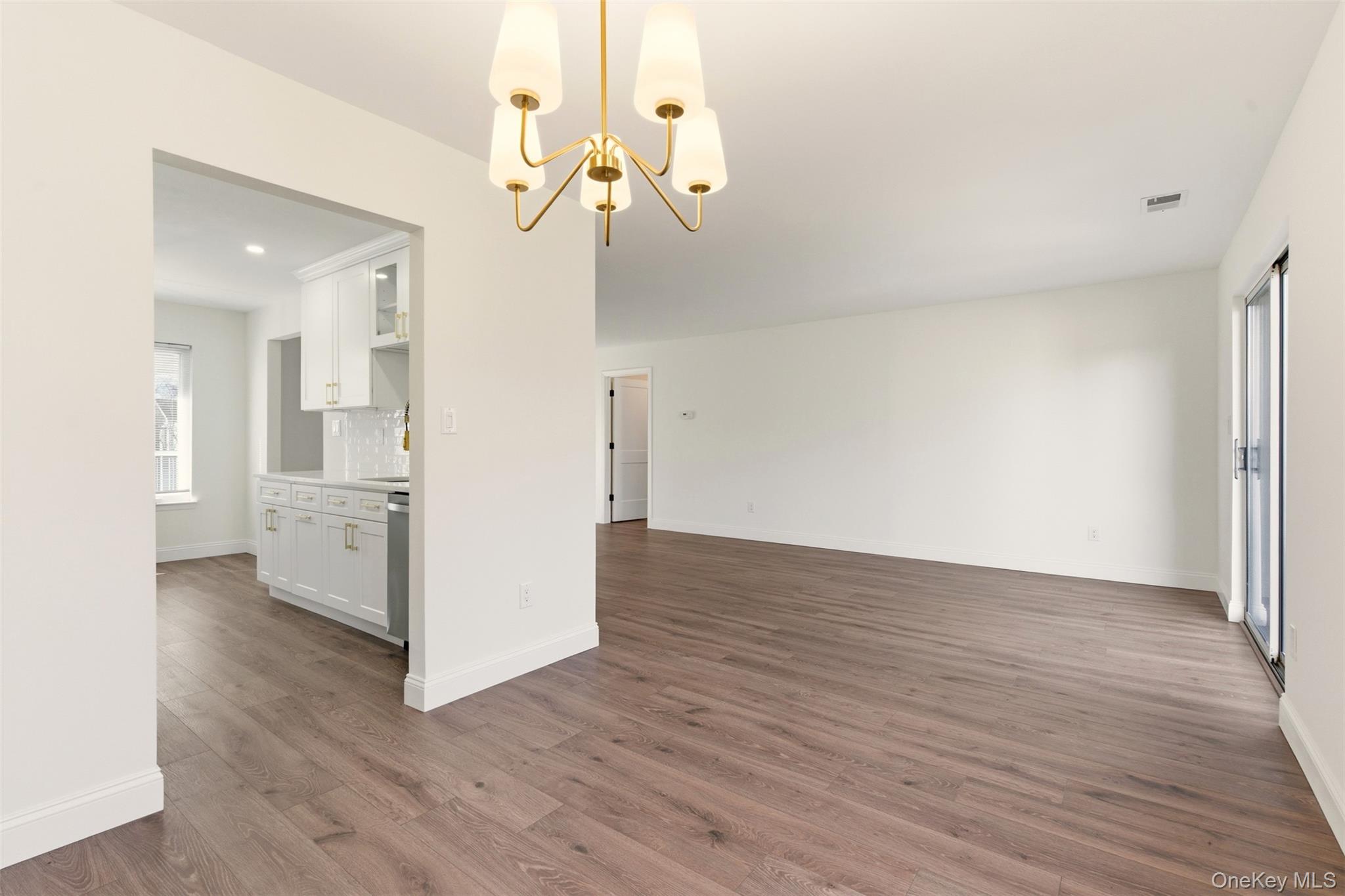 909 Fenway Road St. James, NY 11780 - Photo 11 of 34 Dining Room to Living Room View.