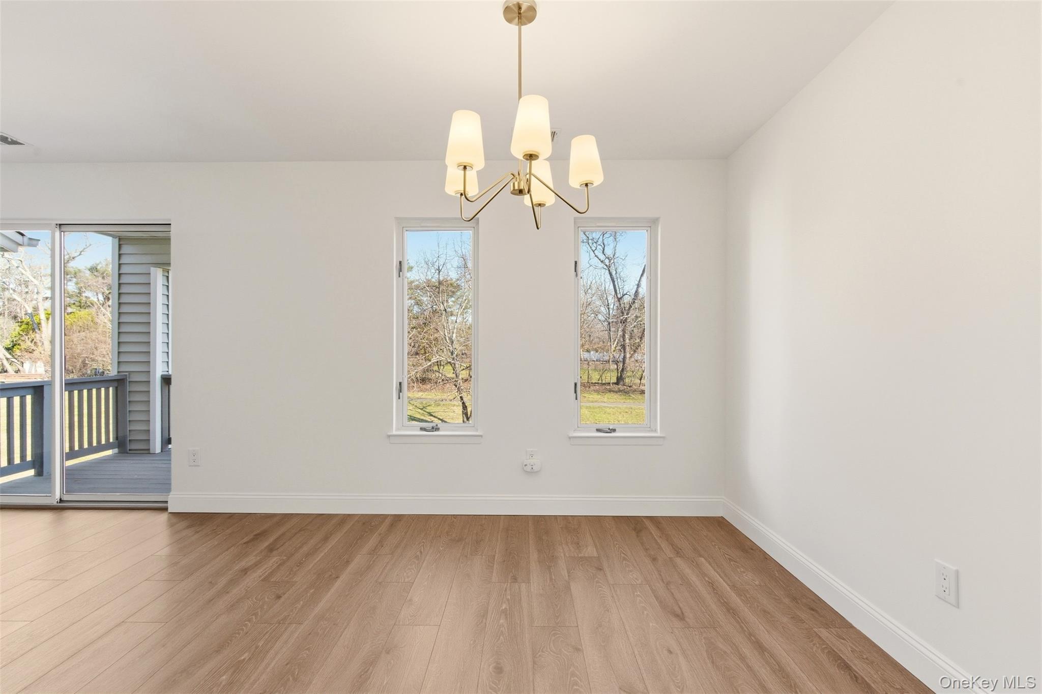 909 Fenway Road St. James, NY 11780 - Photo 12 of 34 Kitchen to Dining Room View.