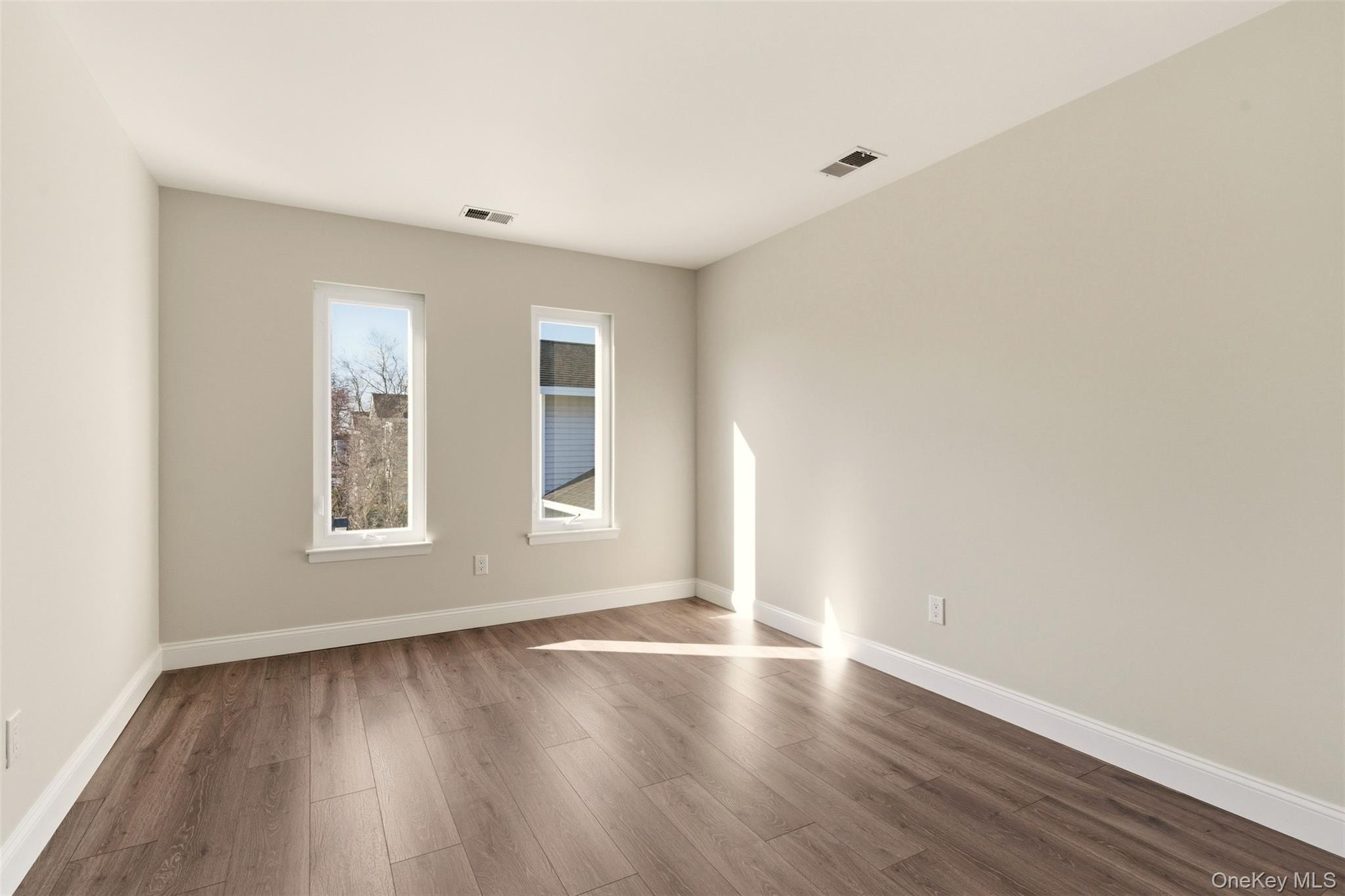 909 Fenway Road St. James, NY 11780 - Photo 19 of 34 Second Bedroom. Lots of Natural Light.