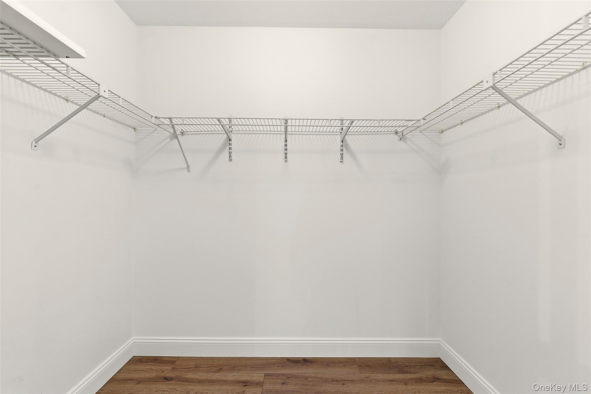 909 Fenway Road St. James, NY 11780 - Photo 21 of 34 Primary Bedroom Large Walk-In Closet