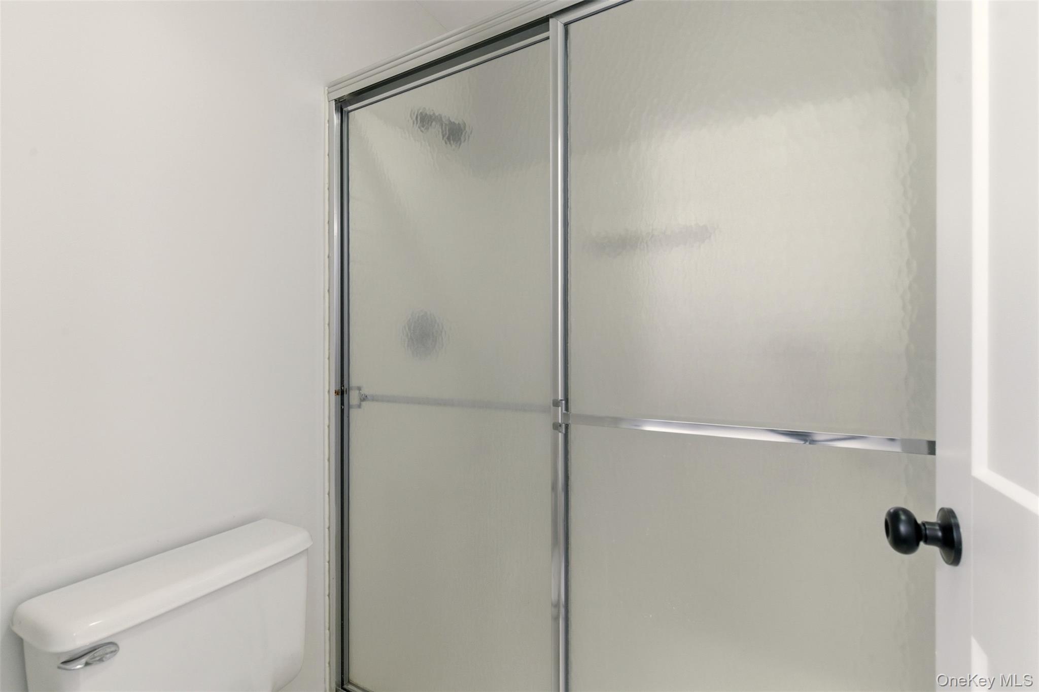 909 Fenway Road St. James, NY 11780 - Photo 23 of 34 Primary Bathroom Shower.