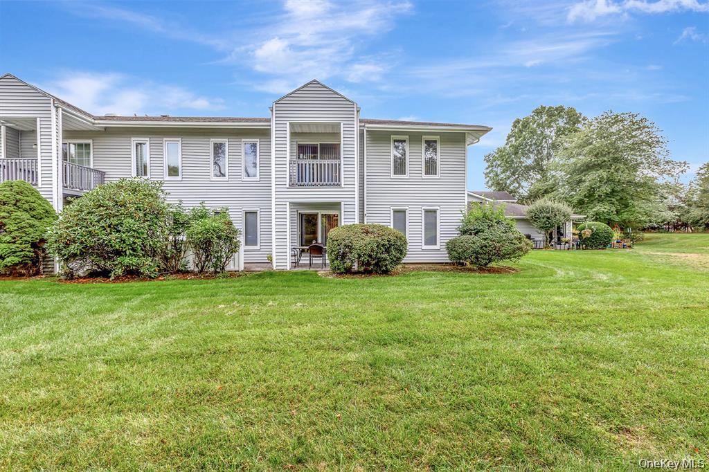 909 Fenway Road St. James, NY 11780 - Photo 4 of 34 View of Deck from lawn area.
