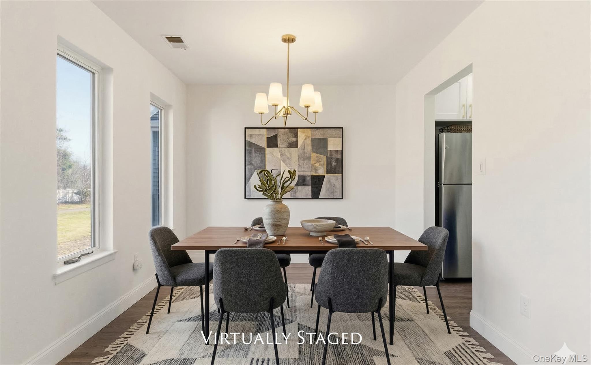 909 Fenway Road St. James, NY 11780 - Photo 10 of 34 Virtually Staged Dining Room. Large Windows with green Views.