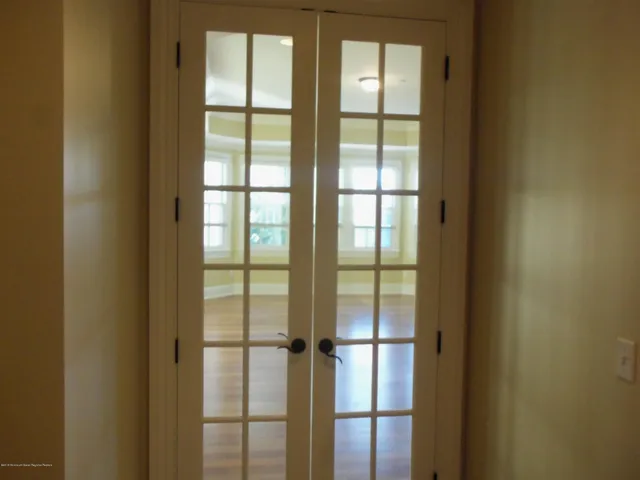 a bathroom with a glass door