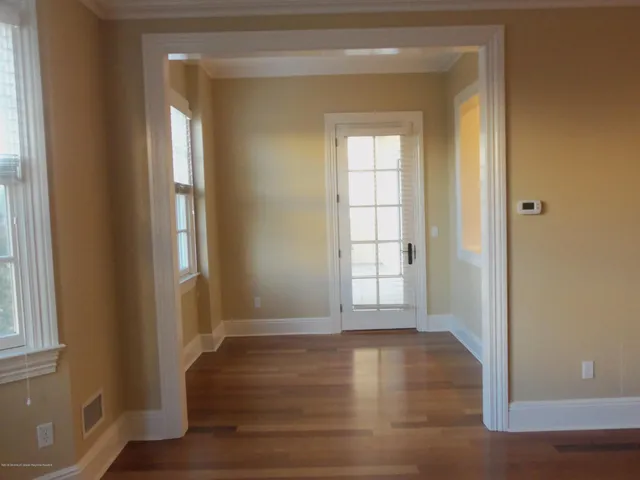 a bathroom with a granite countertop sink mirror and double