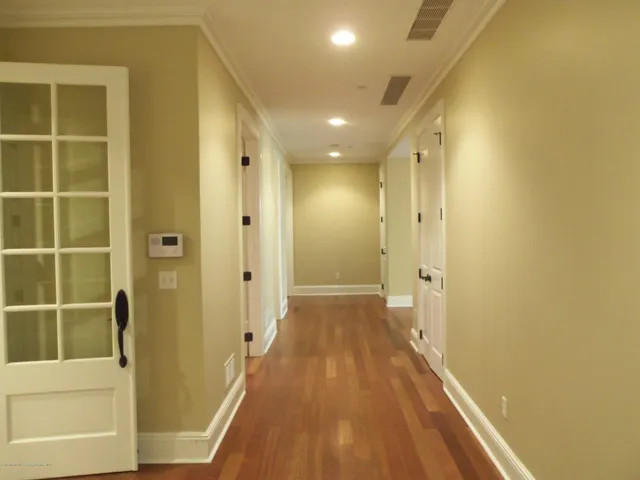 a view of a bathroom with a tub and shower