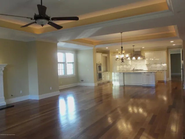 a view of a livingroom with a kitchen